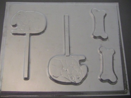 398sp Big Red Dog with Bones Chocolate or Hard Candy Lollipop Mold 398sp Big Red Dog with Bones Chocolate or Hard Candy Lollipop Mold